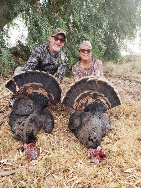 A couple after a turkey hunt in Imperial, California